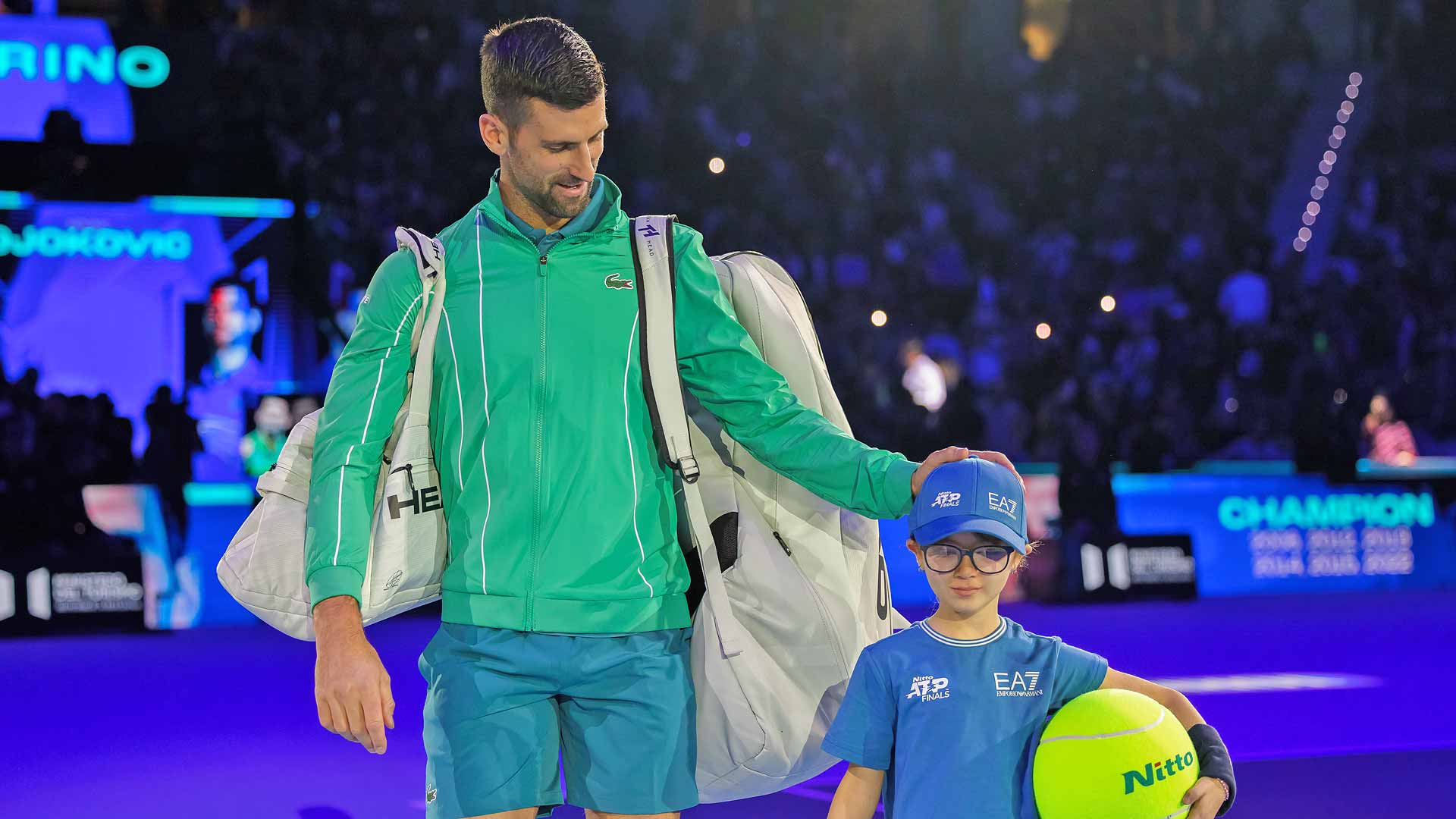 Novak Djokovic and a Nitto ATP Finals mascot