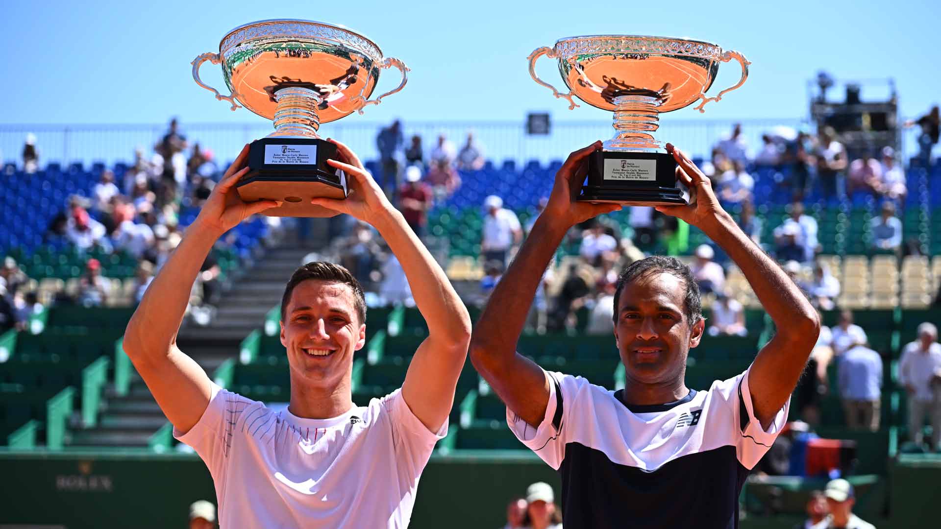 Joe Salisbury (left) and Rajeev Ram collect the title in Monte Carlo. 
