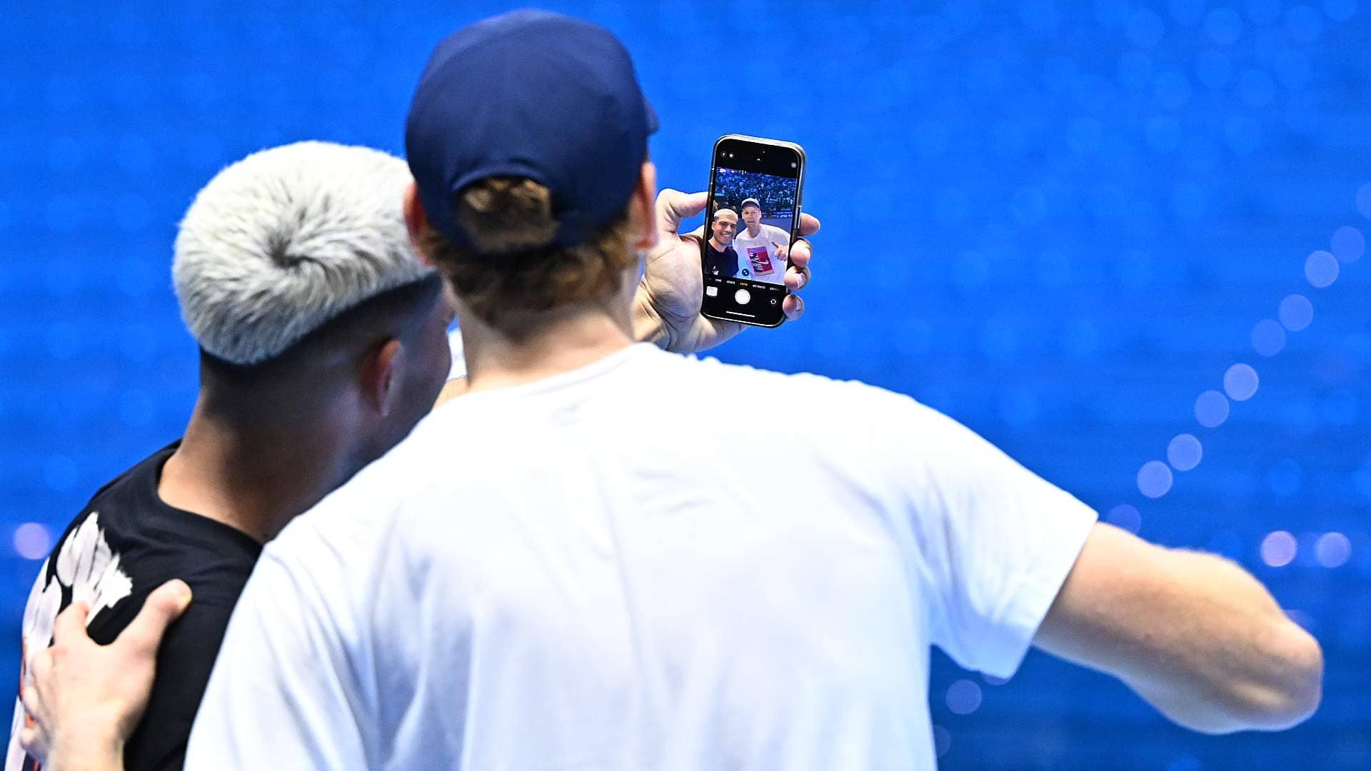 Jannik Sinner and Carlos Alcaraz take a selfie during their practice session ahead of the Nitto ATP Finals.